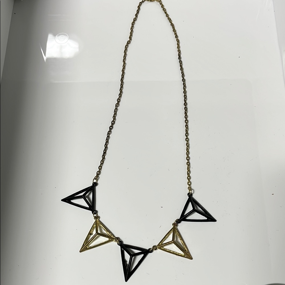 Black and gold geometric design necklace
